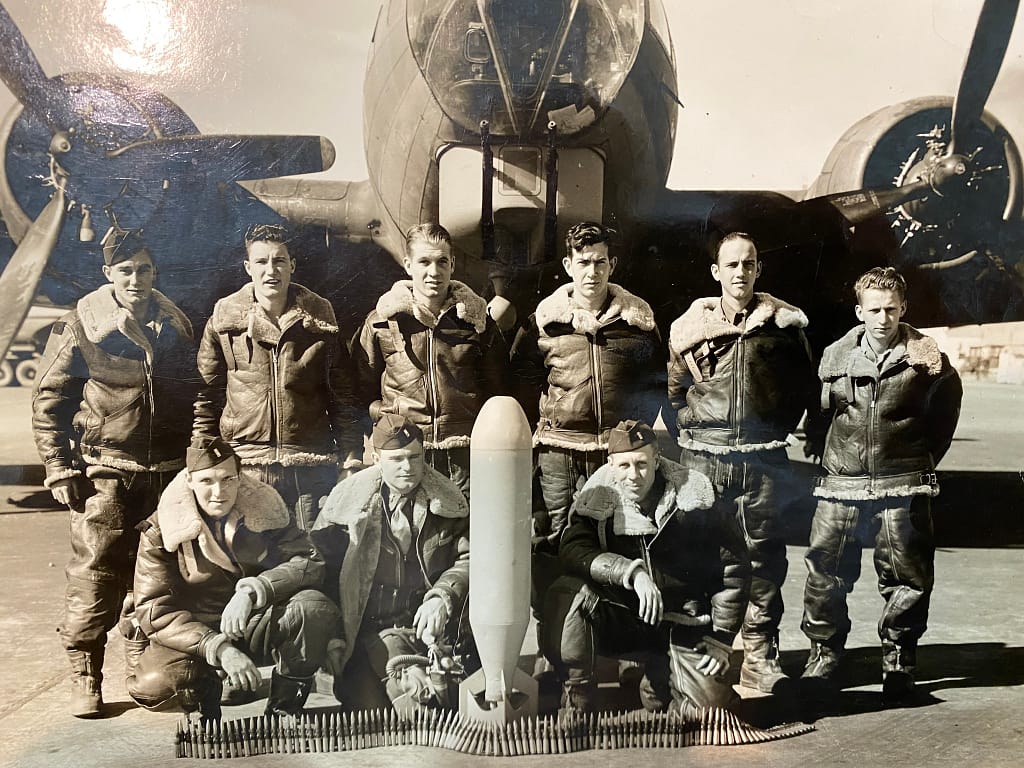 photo of Claude (far left) and his crew