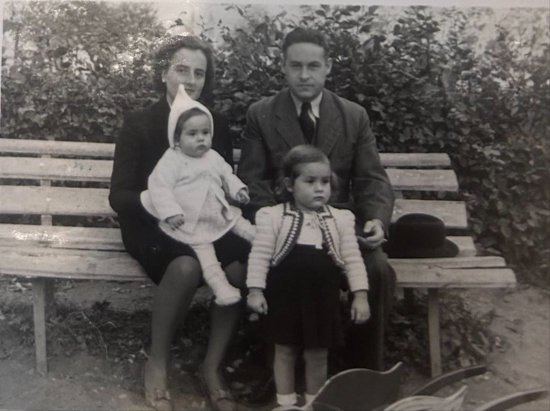 photo of Ingrid with her parents and older sister