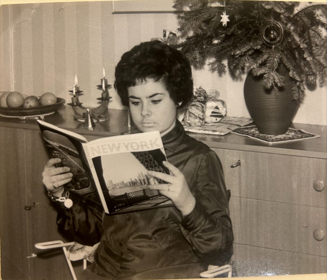 photo of Ingrid reading about New York