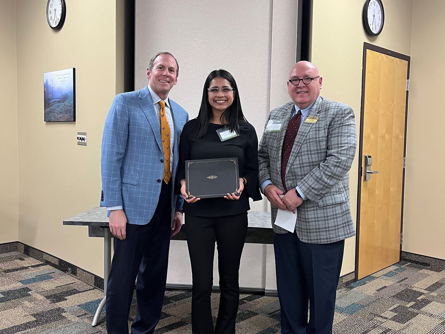 Left to right: Franklin Farrow, Morning Pointe Senior Living co-founder and CEO; Noemi Lozano, scholarship recipient; and Scott Edens, vice president of professional development at Morning Pointe Senior Living