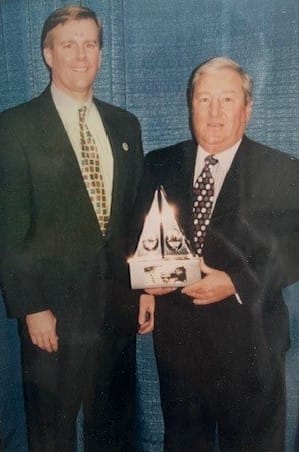 photo of Doc winning the 1997 Agribusiness of the Year Award for the Goshen Animal Clinic