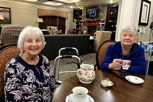 photo of residents at Morning Pointe of East Hamilton having a tea party