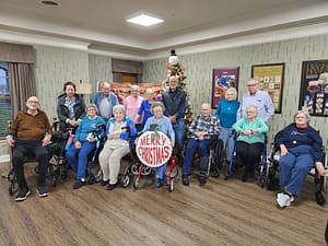 Photo of Residents at Morning Pointe of Danville Assisted Living wishing a merry Christmas