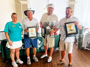 photo of the Golf tournament winners, the Barry Duggan team, with Barry Duggan, Jeff Rice, Evan Ball (not pictured) and Phillip Swanson, as well as Crystal Sutton, executive director at Morning Pointe of Athens (left)