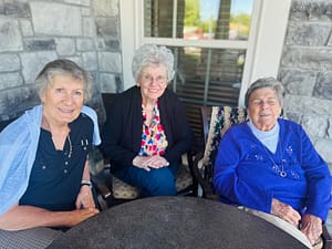 photo, Left to right: Rose Esterle, Kathy Willinger, and Carolyn Redmond