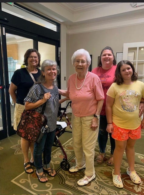 photo of June with visitors from her home church, Mackville Christian Church