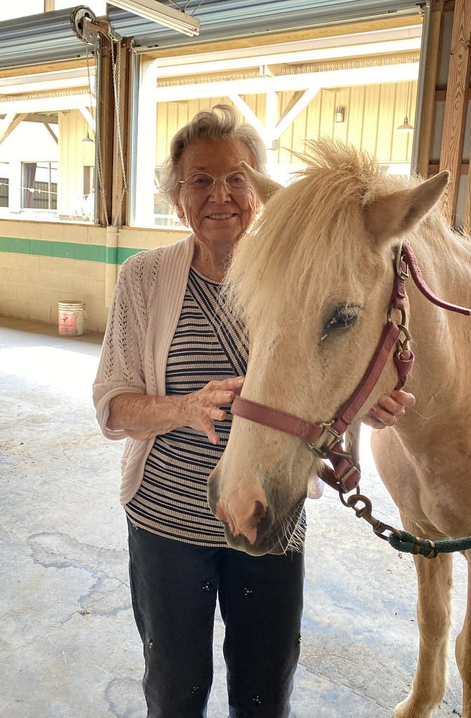 photo of Jean with horse at Shangri-La Therapeutic Academy of Riding 