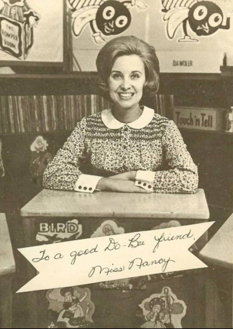 photo of Beverly as Miss Nancy at her desk