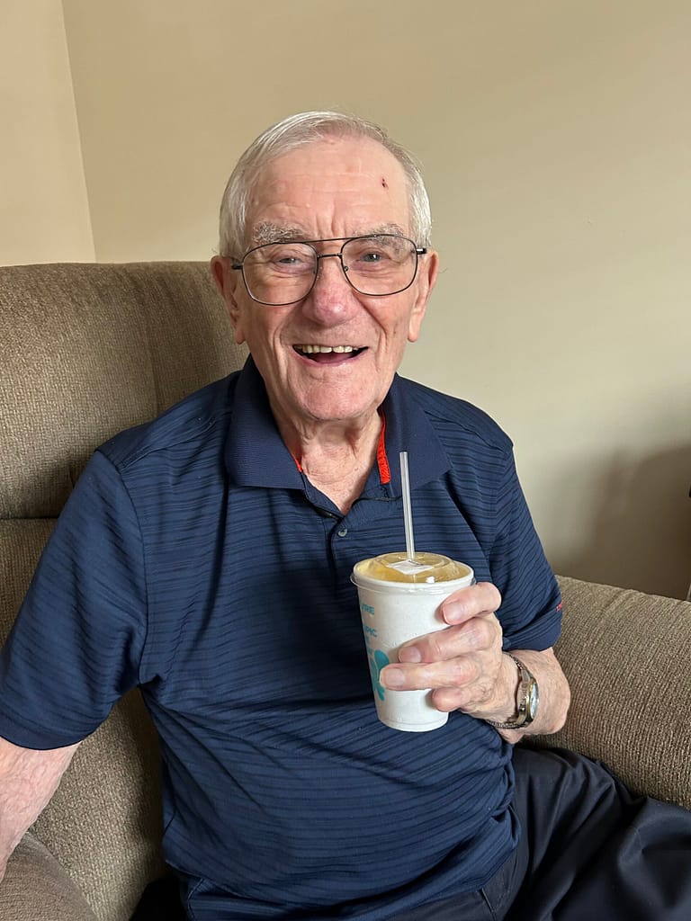 photo of Claude enjoying a Tropical Tuesday smoothie at Morning Pointe of Spring Hill