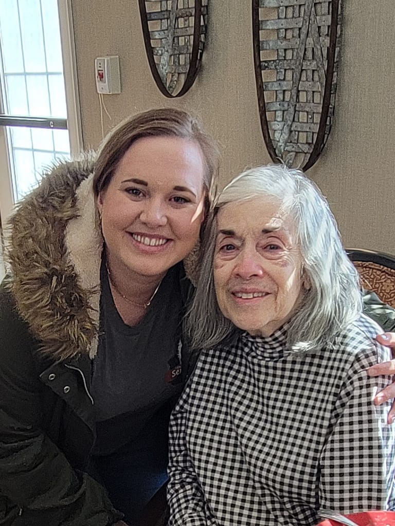 photo of one of the volunteers with a resident