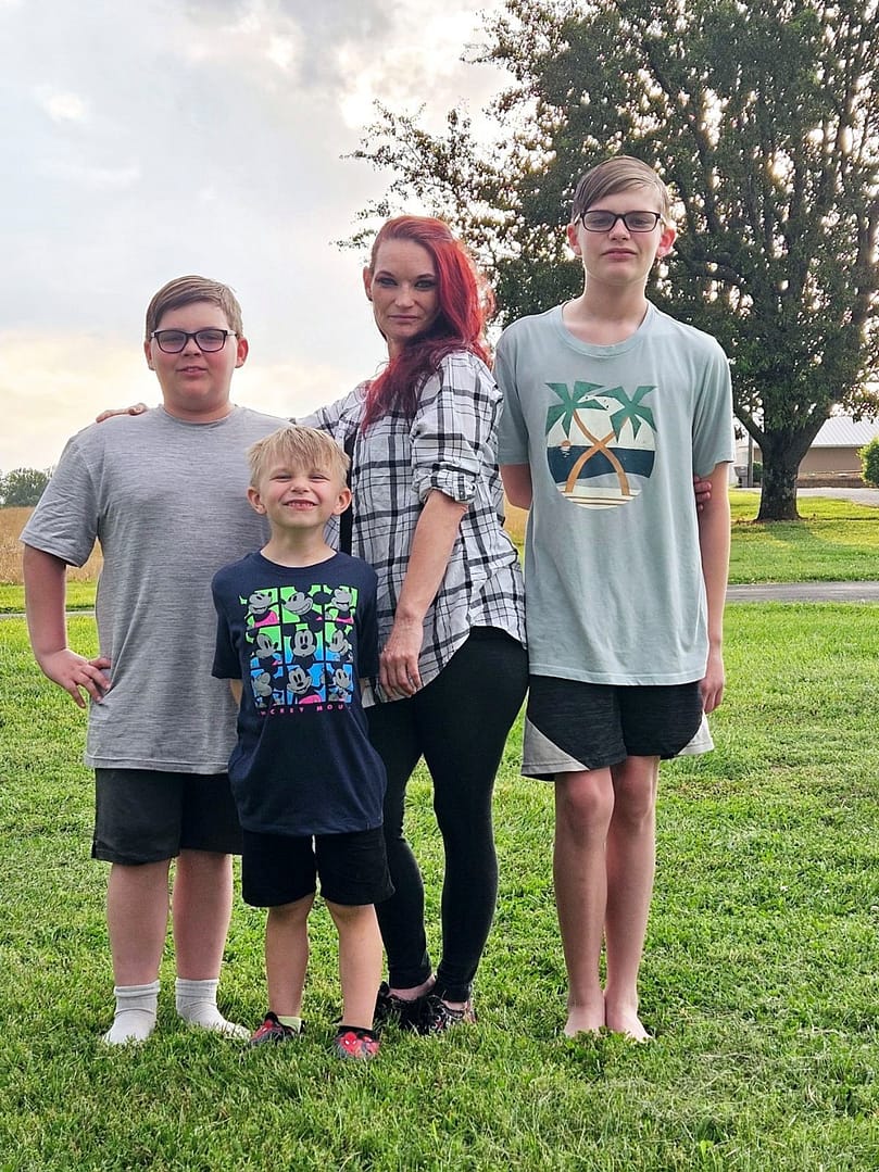 photo of Libby Sansom with her three sons