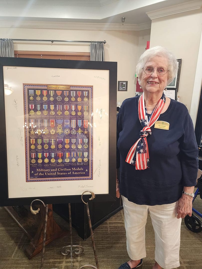 photo of Morning Pointe of Hixson resident Pat Arnold and her puzzle, Medals of Honor