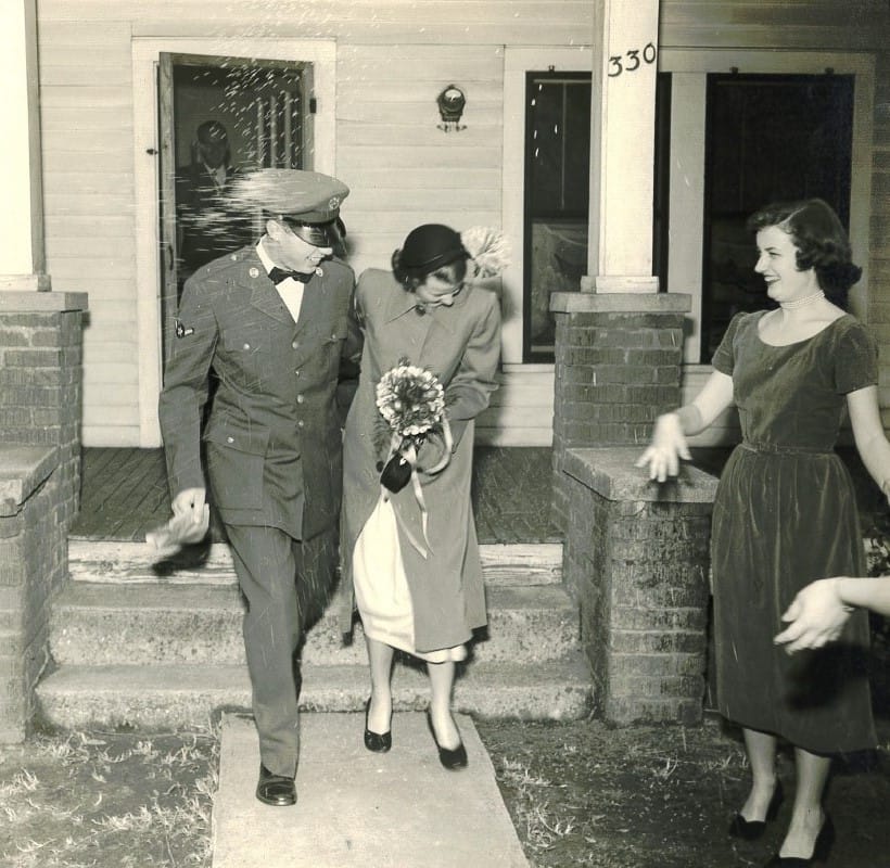 photo of Ted and Ann leaving their wedding