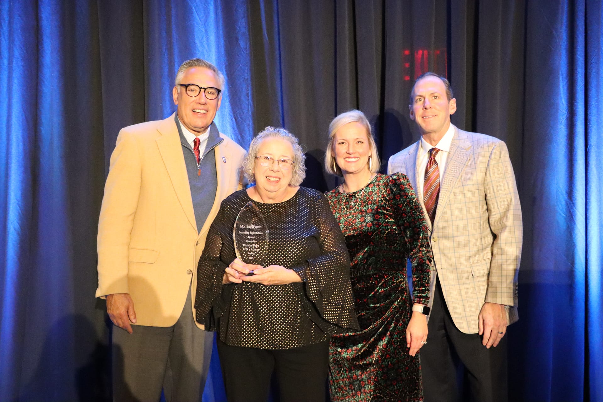 photo, Left to right: Greg A. Vital, Morning Pointe Senior Living co-founder and president; Darlene Pope, licensed practical nurse at Morning Pointe of Athens, TN; Abby Medley, VP of Morning Pointe Senior Living's Lookout Region; and Franklin Farrow, Morning Pointe Senior Living co-founder and CEO