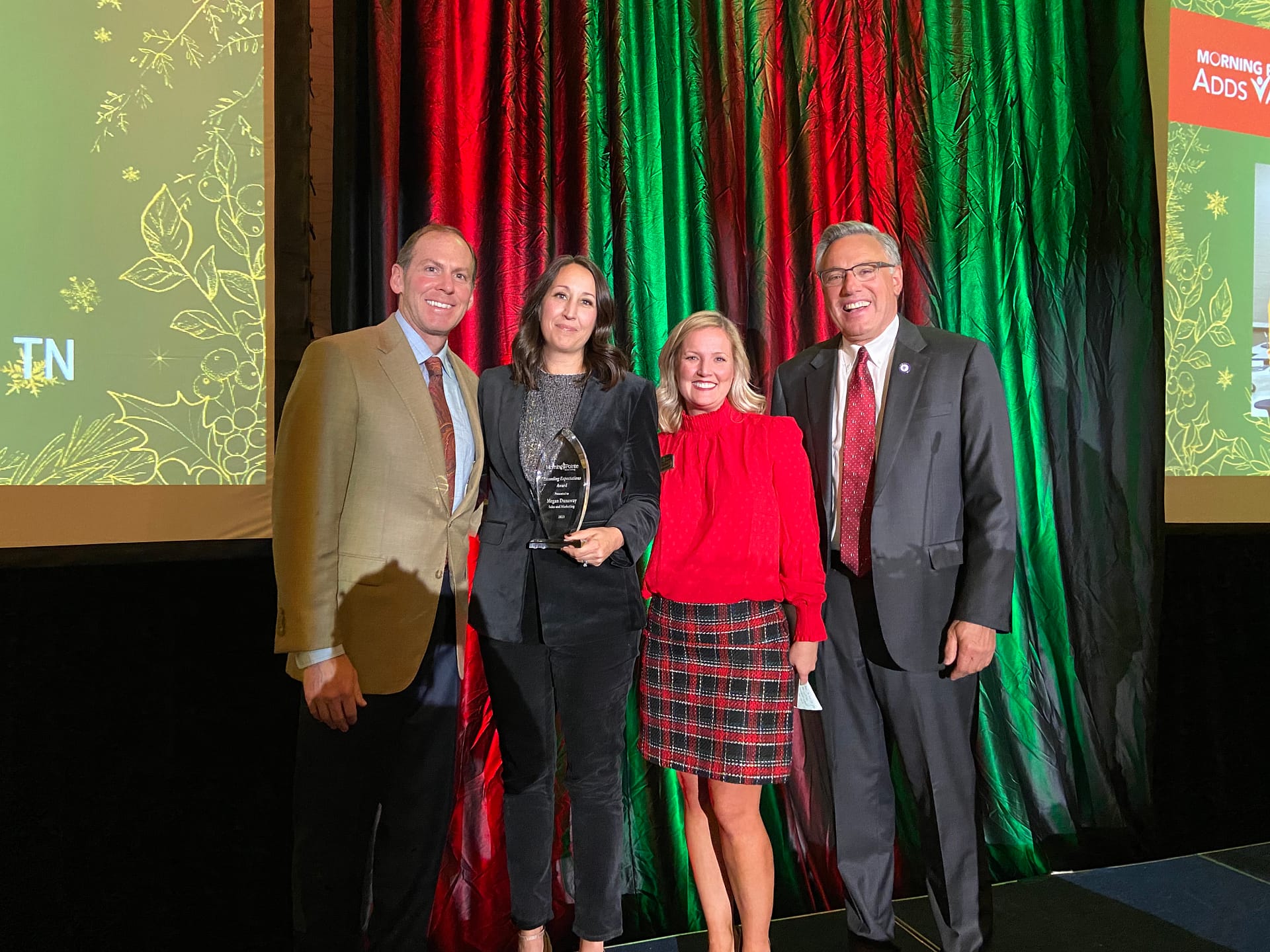 Photo, Left to right: Franklin Farrow, Morning Pointe Senior Living Co-Founder and CEO; Megan Dunaway, Community Relations Director at Morning Pointe of Hardin Valley and Exceeding Expectations winner for Sales and Marketing; Abby Medley, Vice President of Morning Pointe's Appalachian Region; and Greg A. Vital, Morning Pointe Co-Founder and President