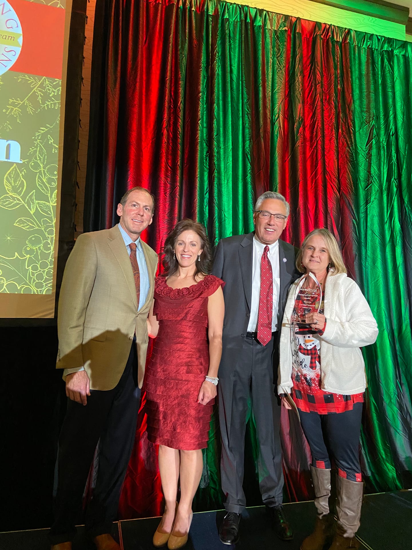 photo, left to right: Franklin Farrow, Morning Pointe Senior Living Co-Founder and CEO; Dana Boblitt, Vice President of Morning Pointe's Bluegrass Region; Greg A. Vital, Morning Pointe Senior Living Co-Founder and President; and Loretta Cameron, CNA at Morning Pointe of Richmond KY and Exceeding Expectations winner for Resident Care