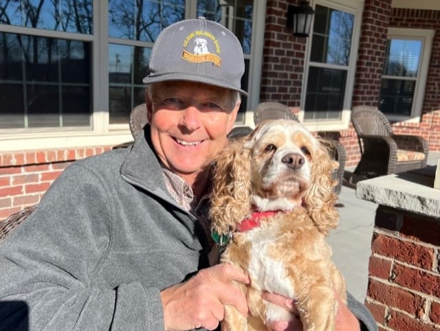 Steve Campbell with his cocker spaniel, Addie