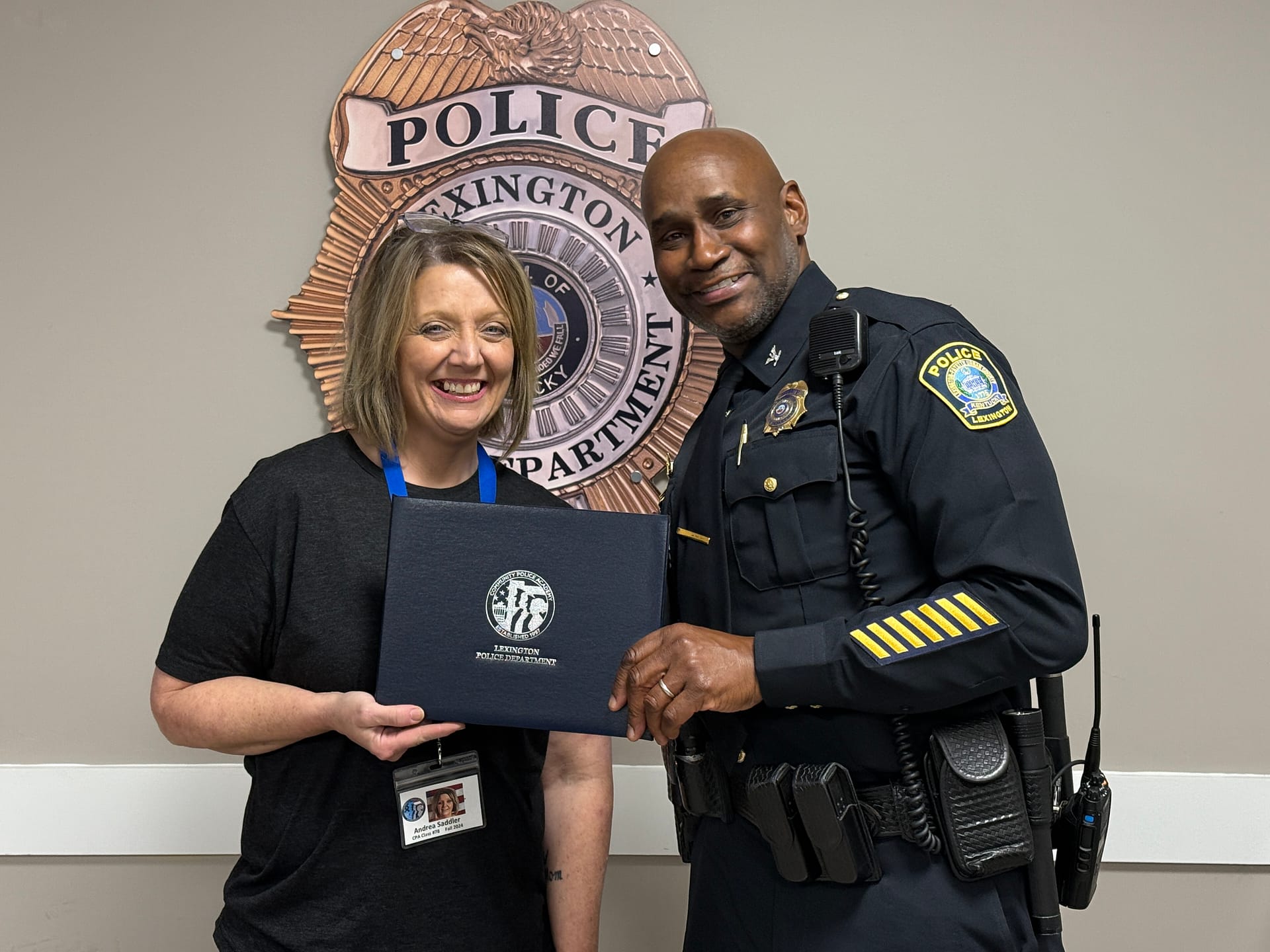 Andrea Saddler, life enrichment director, with Chief Weathers