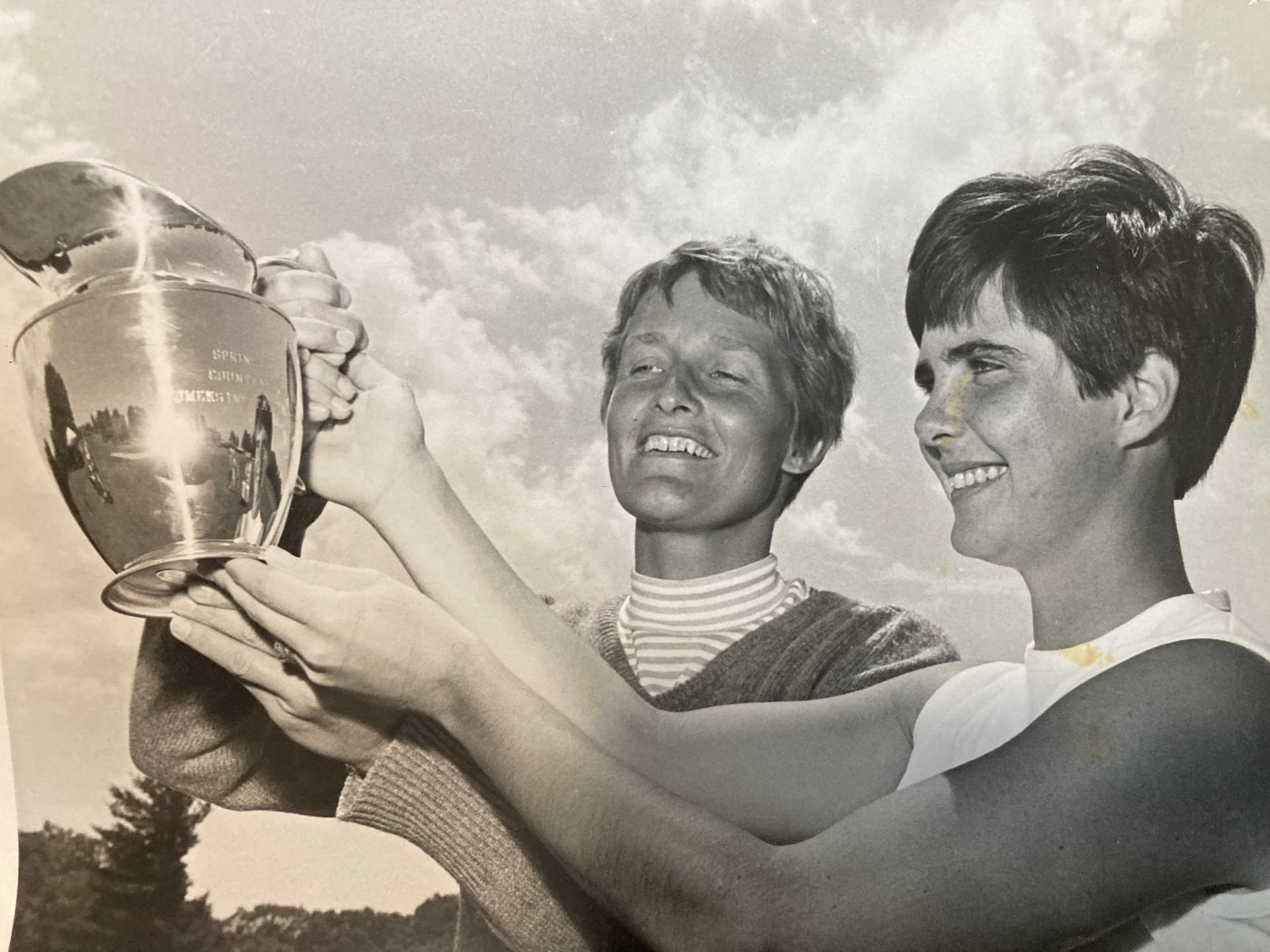 photo of Lynne (right) with one of her trophies