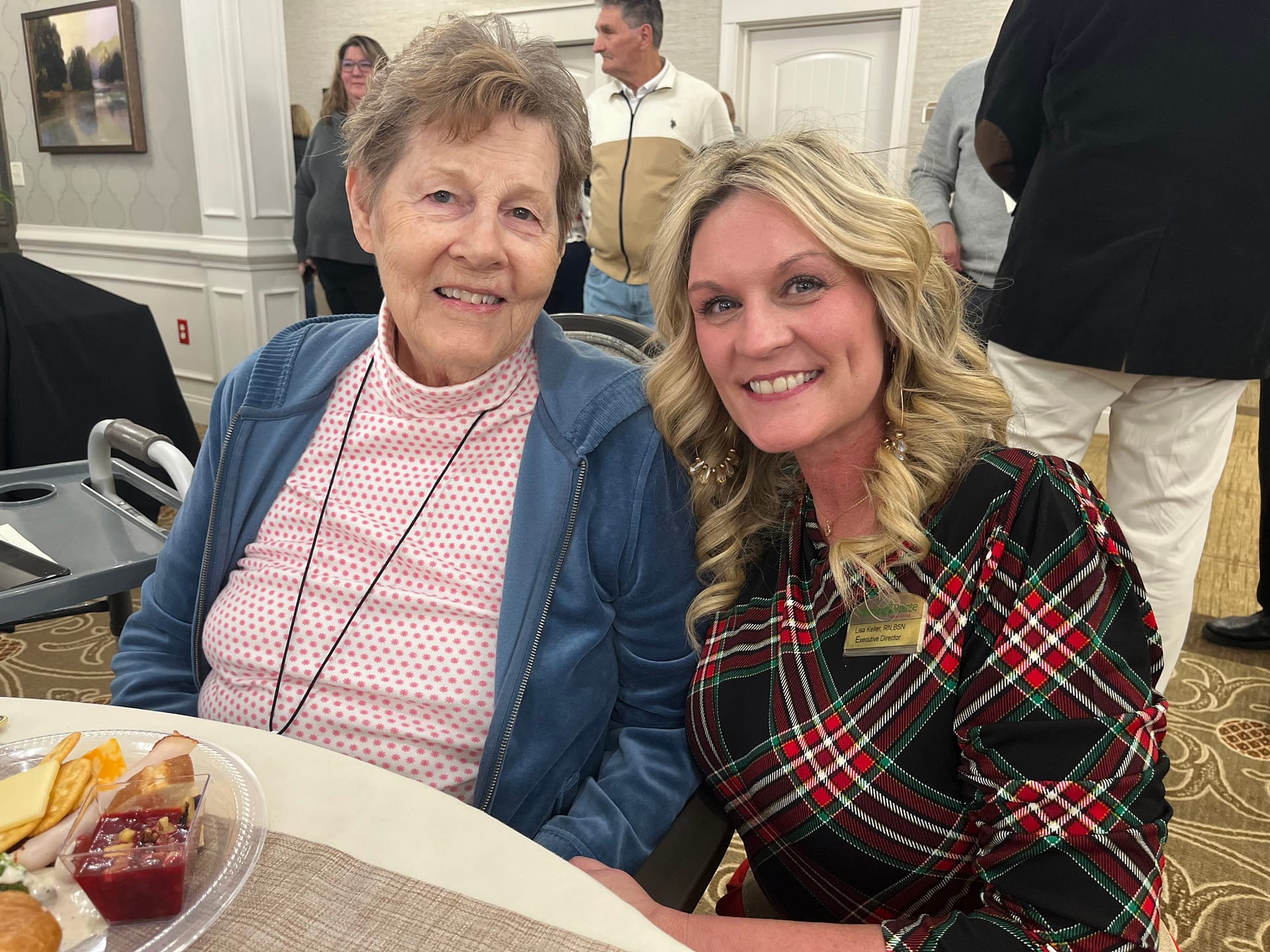 photo of Lisa Keller, RN, executive director, with a lady