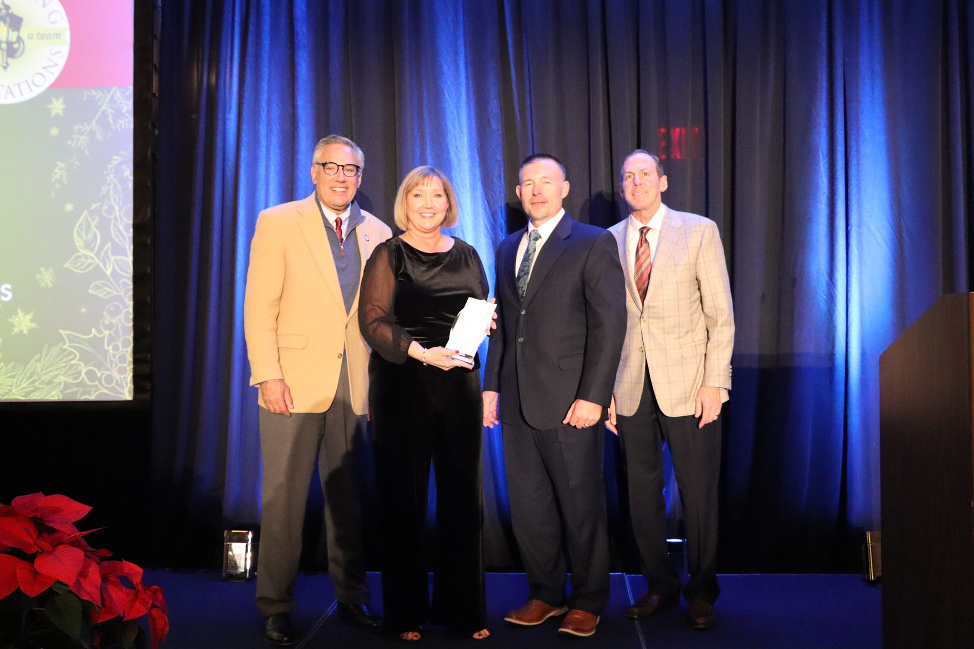 photo, Left to right: Greg A. Vital, Morning Pointe Senior Living co-founder and president; Kay Lorick, community relations director at the Morning Pointe of Powell, TN, campus; Josh Lowe, VP of Morning Pointe Senior Living's Smoky Region; and Franklin Farrow, Morning Pointe Senior Living co-founder and CEO