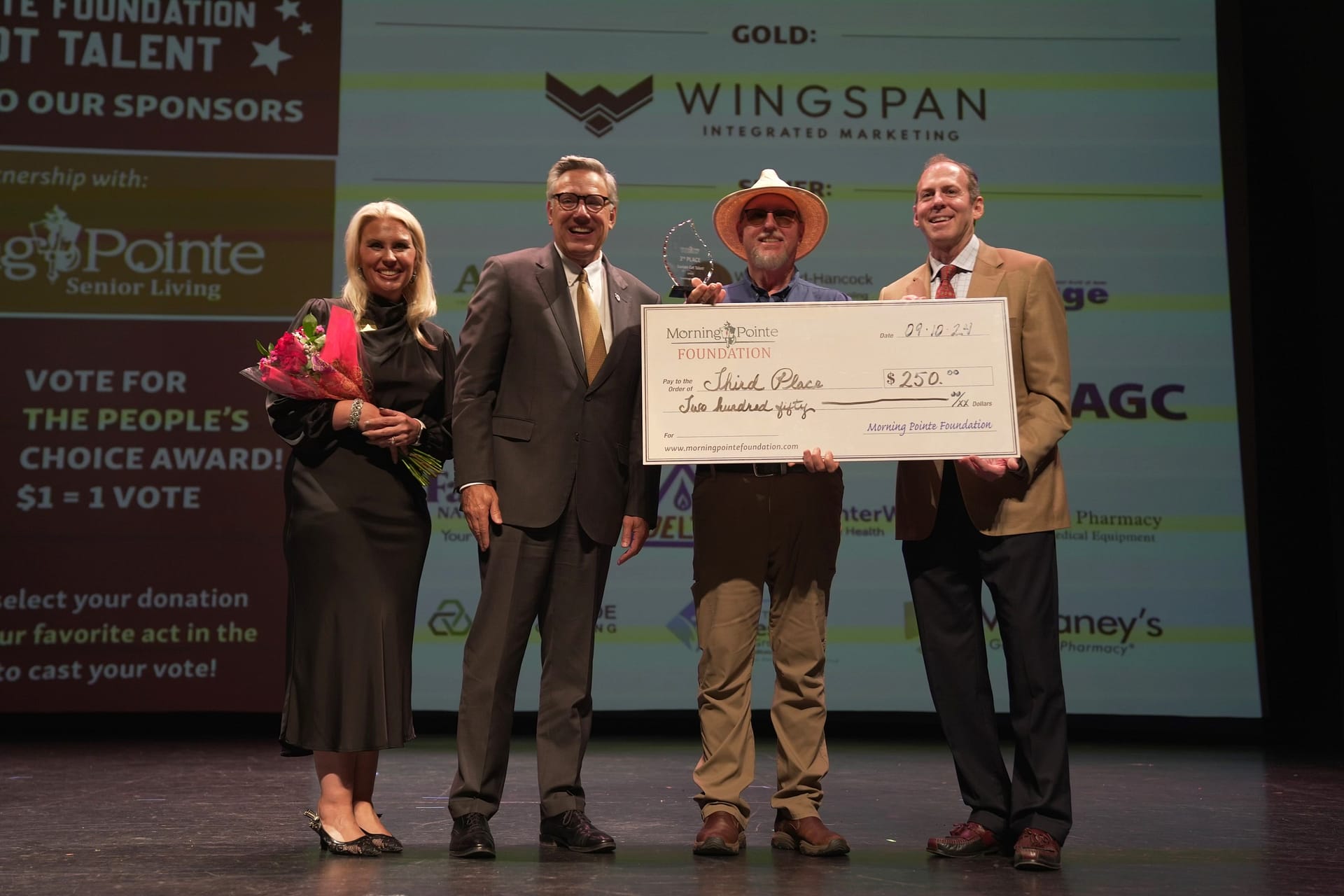 photo, Left to right: Miranda Perez, Morning Pointe Foundation executive director; Greg A. Vital, Morning Pointe Senior Living Co-Founder and President; Keith Williams, third-place winner; and Franklin Farrow, Morning Pointe Senior Living Co-Founder and CEO