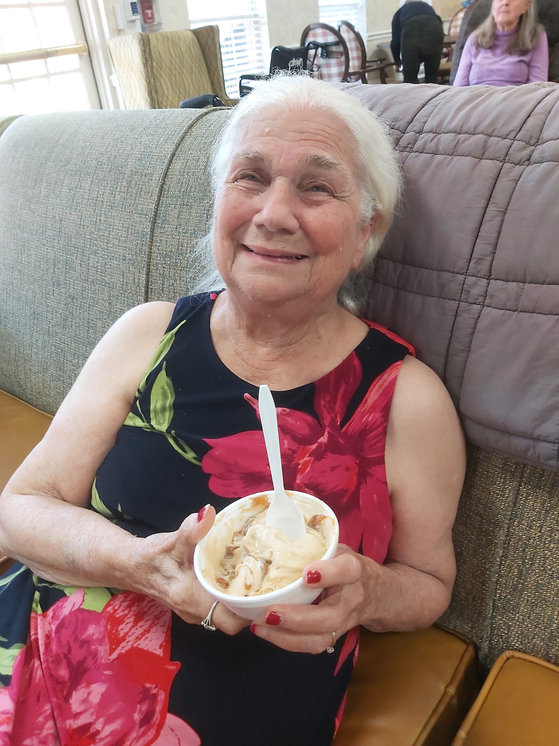 photo of Carolyn enjoying her favorite food, ice cream, at The Lantern