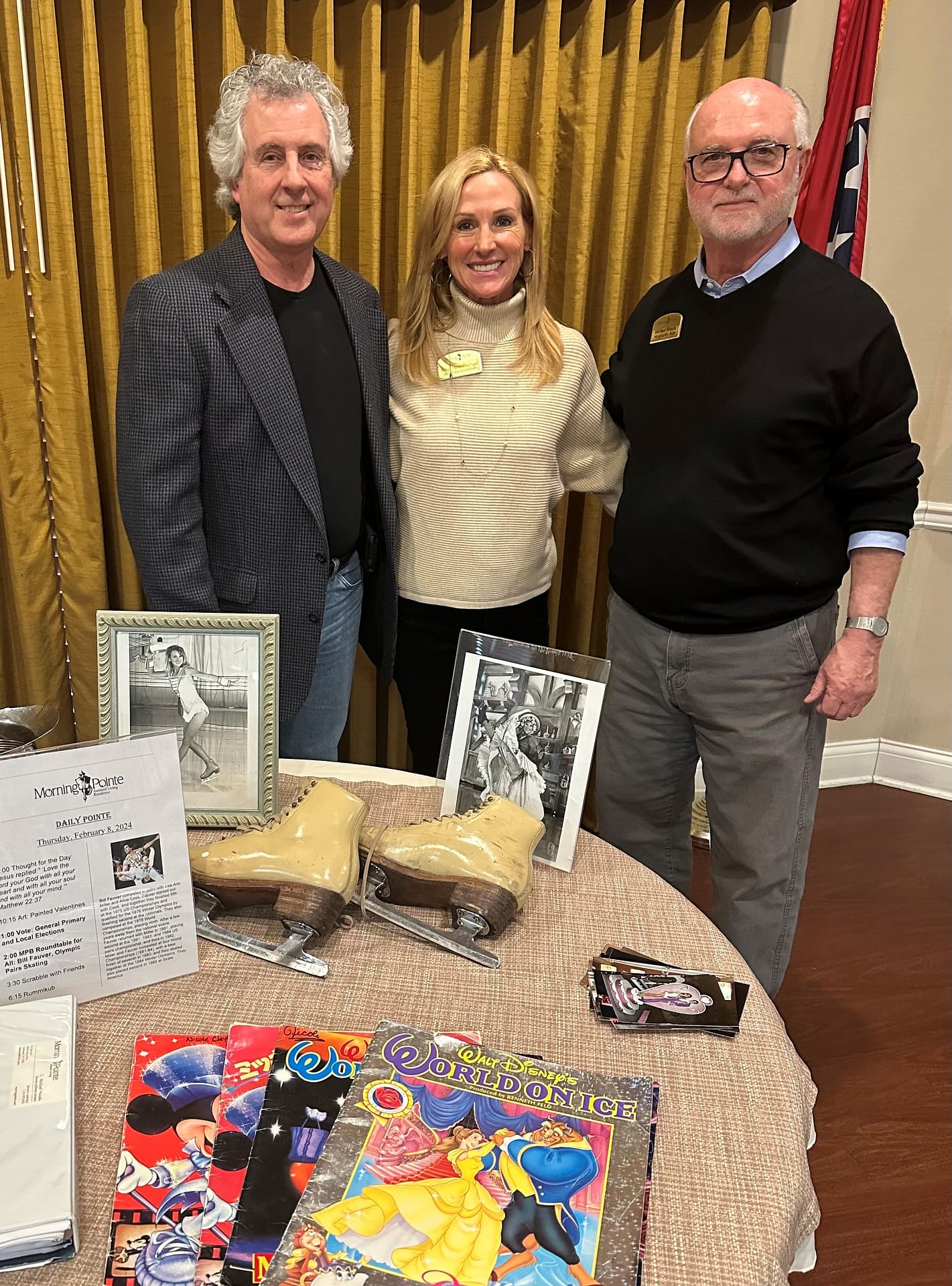 photo of Nicole with Olympic skater Bill Fauver (left) and Mike Woods, hospitality aide at Morning Pointe of Brentwood