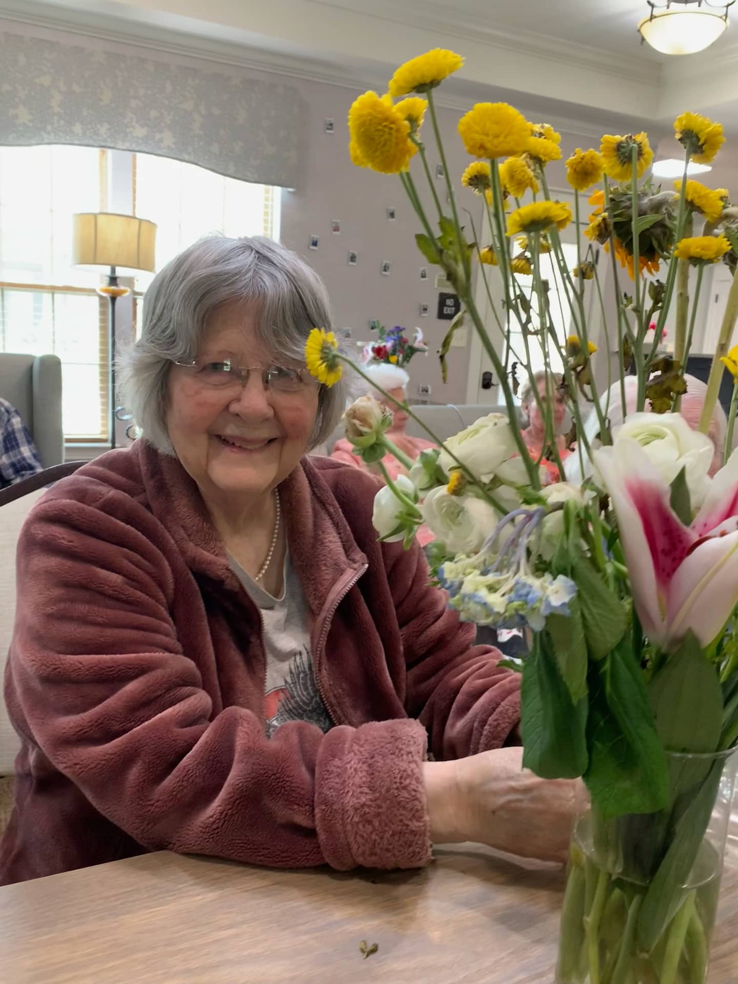 photo of Lynne at The Lantern arranging flowers