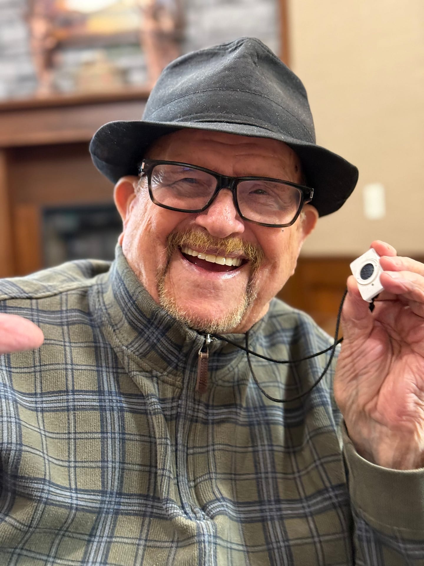 photo of MP Chattanooga resident with one of the call-button necklaces