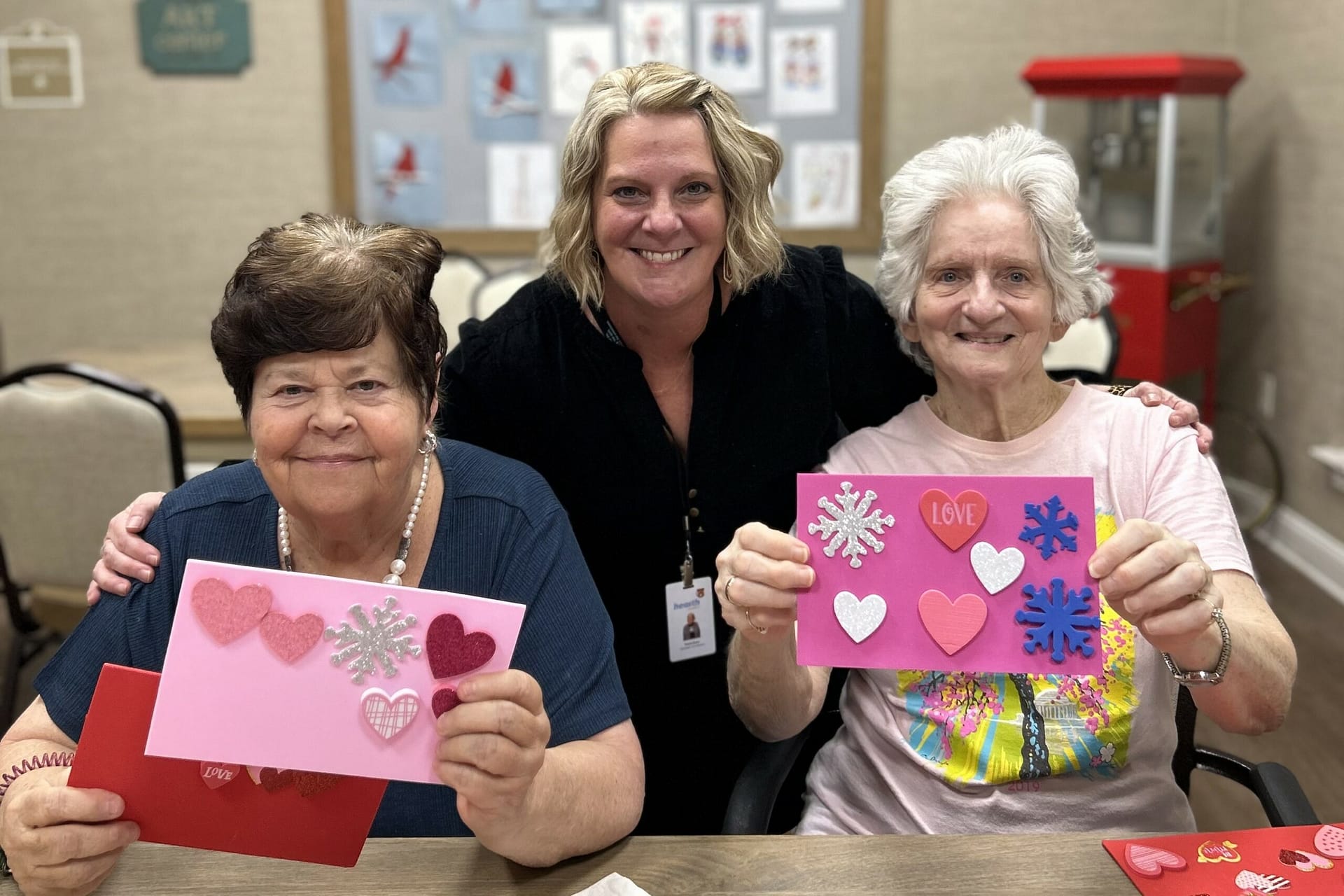 photo of Kristi Born from Hearth Hospice making sticker cards with residents at The Lantern at Morning Pointe of Chattanooga, TN