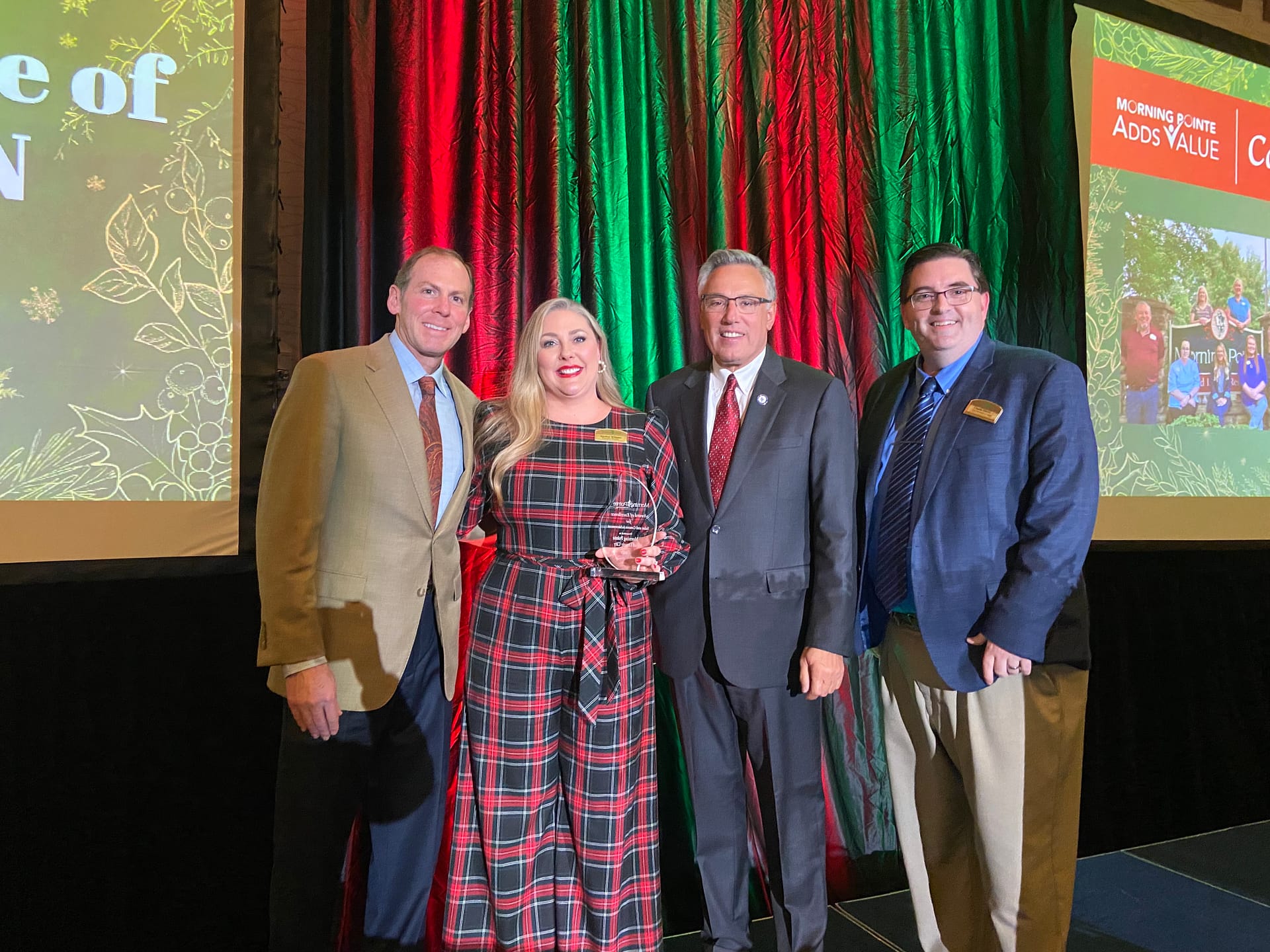 Left to right: Franklin Farrow, Morning Pointe Senior Living Co-Founder and CEO; Lindsay Williams, Executive Director of Morning Pointe of Lenoir City, winner of the Sales and Census Achievement Award; Greg A. Vital, Morning Pointe Senior Living Co-Founder and President; and Charlie Harris, Morning Pointe's VP of Sales and Marketing