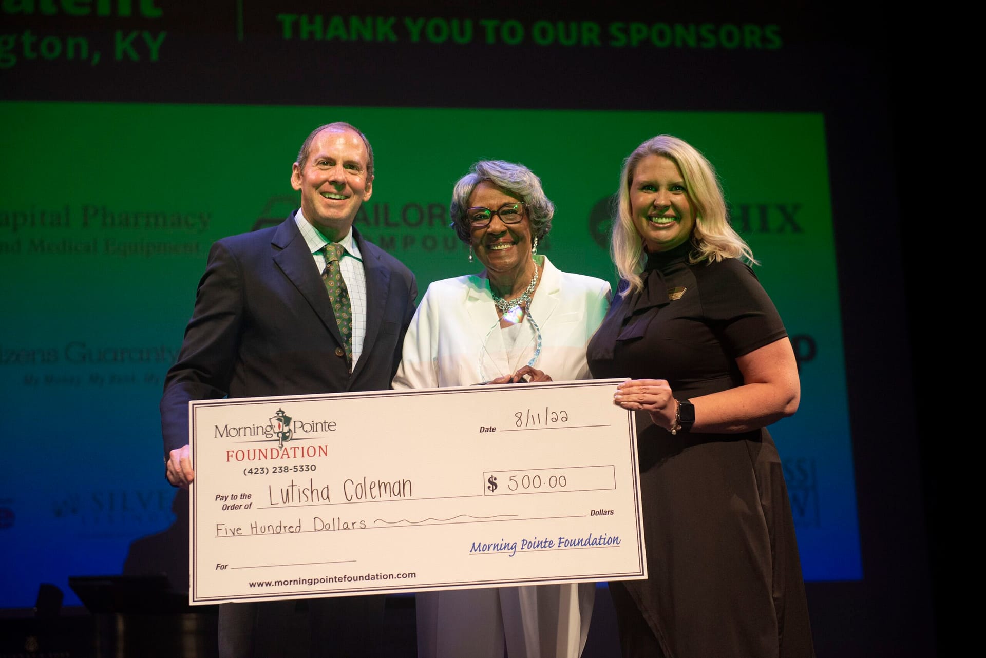 photo of Franklin Farrow, Morning Pointe Senior Living Co-founder and CEO; Lutisha Coleman, first-place winner; and Miranda Perez, Morning Pointe Foundation Executive Director
