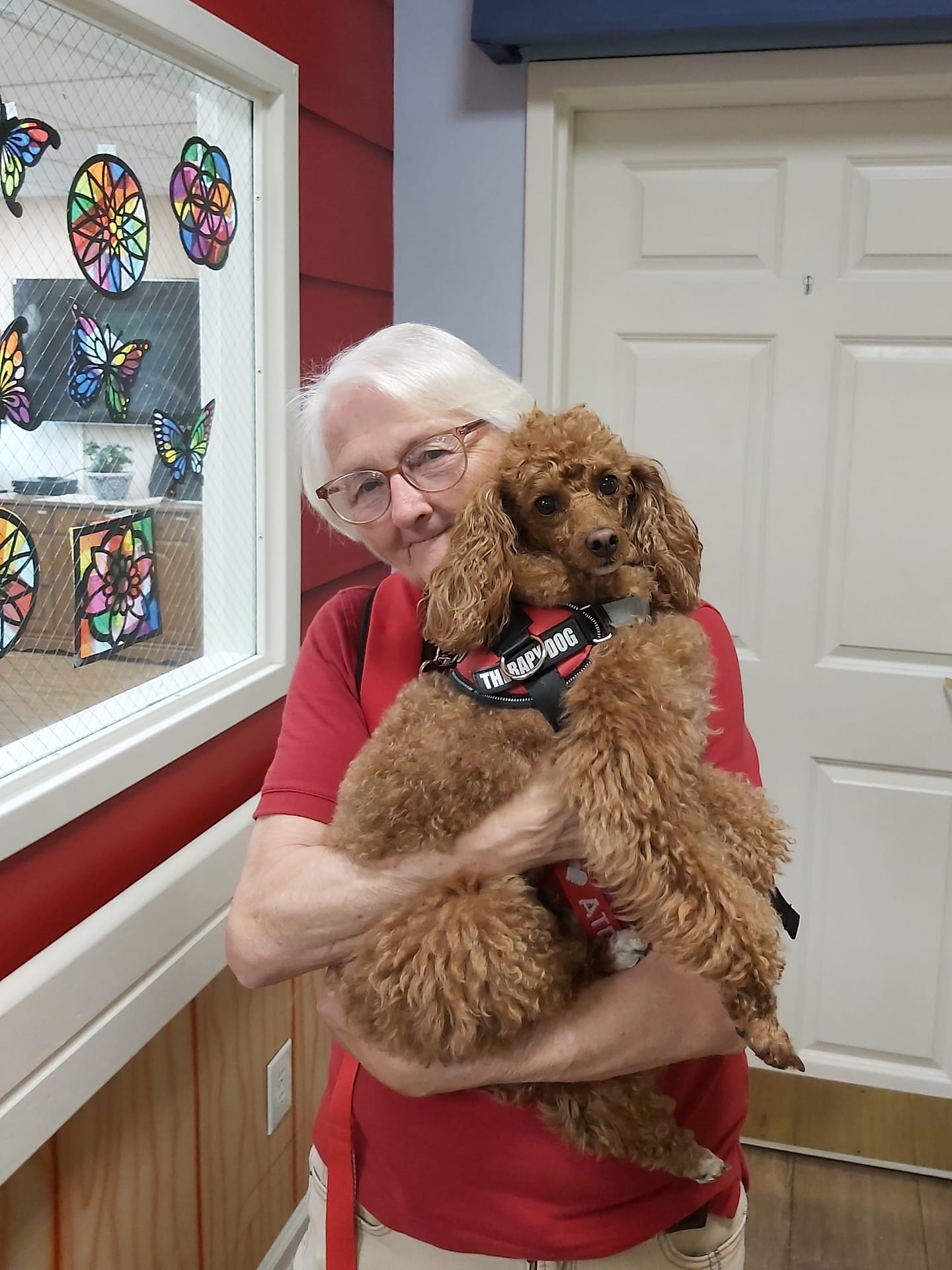 photo of volunteer Nancy Michel and her dog Lucy