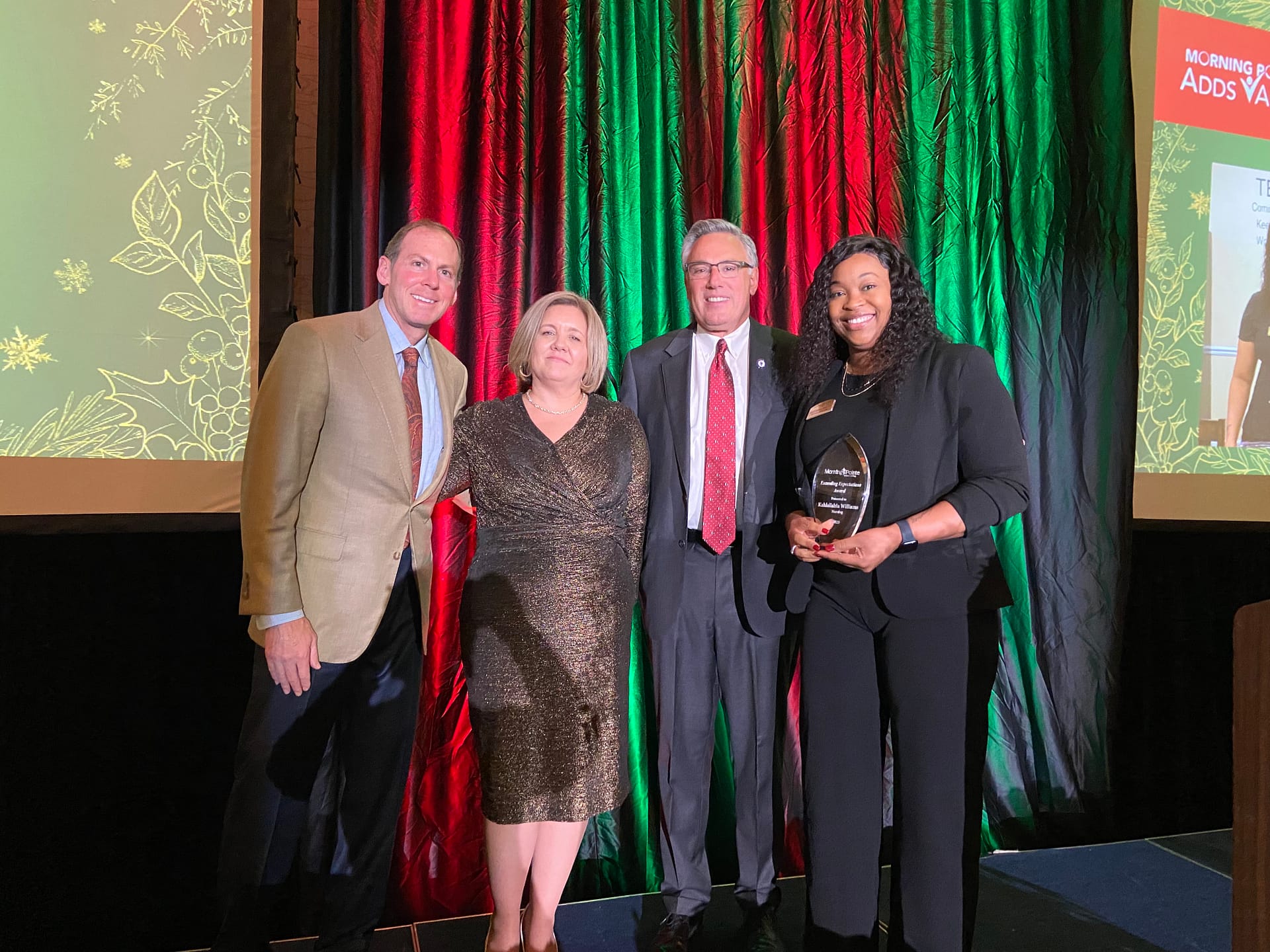 photo of, left to right: Franklin Farrow, Morning Pointe Senior Living Co-Founder and CEO; Tonie Venable, Vice President of Morning Pointe's Cumberland Region; Greg A. Vital, Morning Pointe Senior Living Co-Founder and President; and Kahlalishia Williams, Director of Nursing at Morning Pointe of Tuscaloosa and Exceeding Expectations Award winner for Nursing